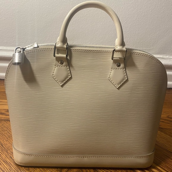 Louis Vuitton
Alma Handbag white Epi Leather PM - Picture 16 of 16
